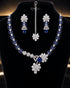 "Sapphire blue American diamond necklace set with matching tikka and earrings on display"