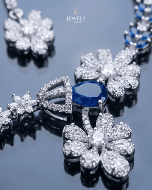 "Close-up of original AD stones and sapphire blue crystal on silver polish bridal necklace"