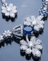 "Close-up of original AD stones and sapphire blue crystal on silver polish bridal necklace"