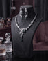 "Emerald green AD vine necklace set with matching earrings on display bust by Jewels by Sarah"
