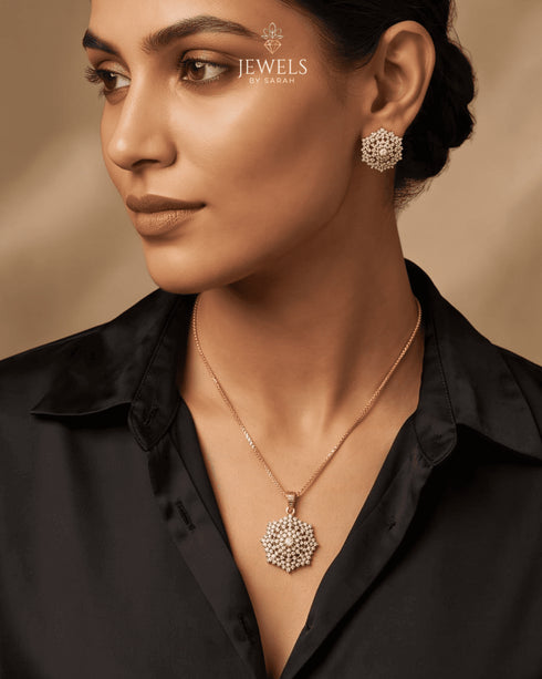 "Model wearing 22K gold polish jurao stone necklace and earrings styled with black shirt"