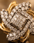 "Close-up of Swirling crystal floral stud earring with two-tone gold finish by Jewels by Sarah"