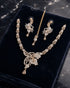 Mint pink gold AD butterfly necklace set with tikka and earrings on navy velvet by Jewels by Sarah"