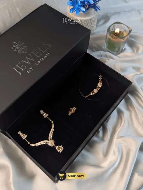 Gold-plated luxury formal jewelry set including crown ring and bracelet in a luxury box