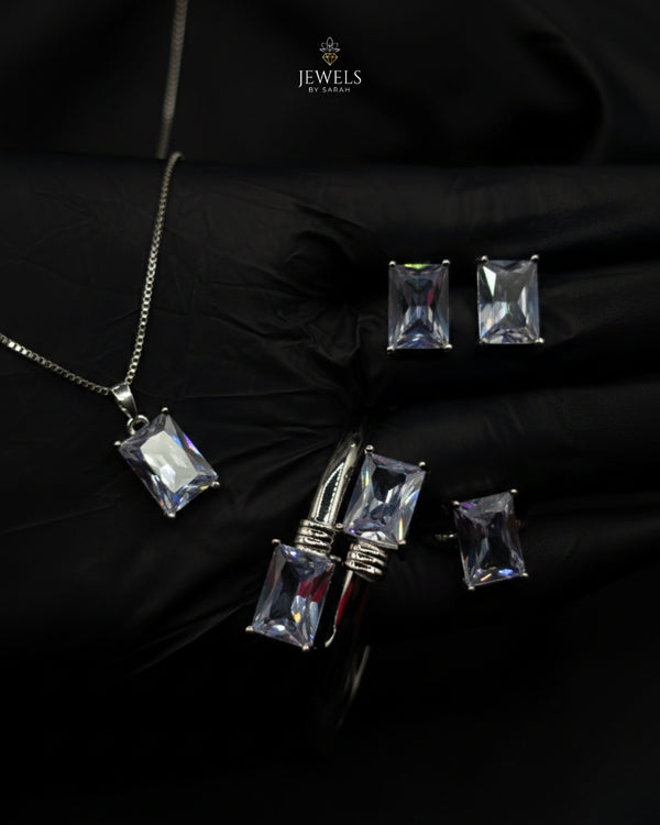 Complete silver-tone jewelry suite with clear rectangular crystal stones - Jewels by Sarah.