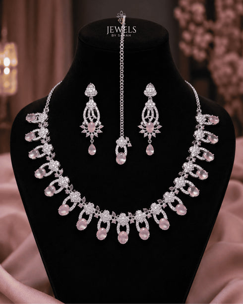 "Mint pink AD scalloped necklace set with tikka and earrings on display bust by Jewels by Sarah"