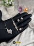 Elegant rose pink zircon ring and bracelet set for university or office wear.