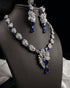 "Sapphire blue feather AD necklace set with earrings on display bust by Jewels by Sarah"