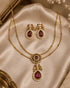 South Indian layered necklace set with ruby drop pendant and earrings on satin fabric - Jewels by Sarah Signature Collection