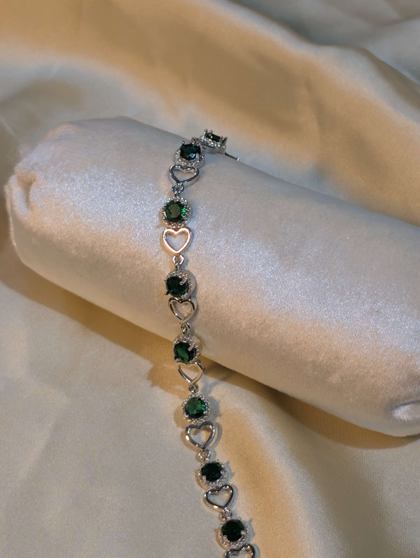 Silver Plated Bracelet with Alternating Round Emerald Green Zircons and Open Heart Links - Artificial Jewellery Pakistan