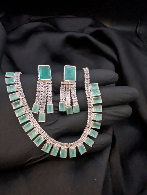 Modern silver-tone zircon necklace set with diamond-like brilliance.