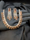 Close-up of a Gold Champagne 1 Karat Zircon necklace and earring set for romantic styling.