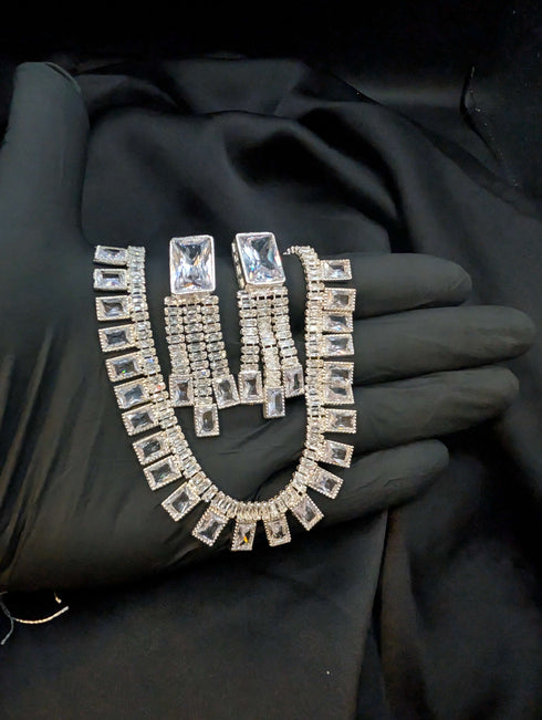 Modern silver-tone zircon necklace set with diamond-like brilliance.