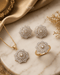 "22K gold polish jurao stone snowflake necklace set with earrings and ring on marble by Jewels by Sarah"