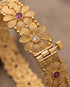 Close up of South Indian bangle hinge clasp and floral stone detail