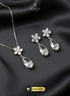Silver clear zircon flower pendant set with hanging teardrop stones.