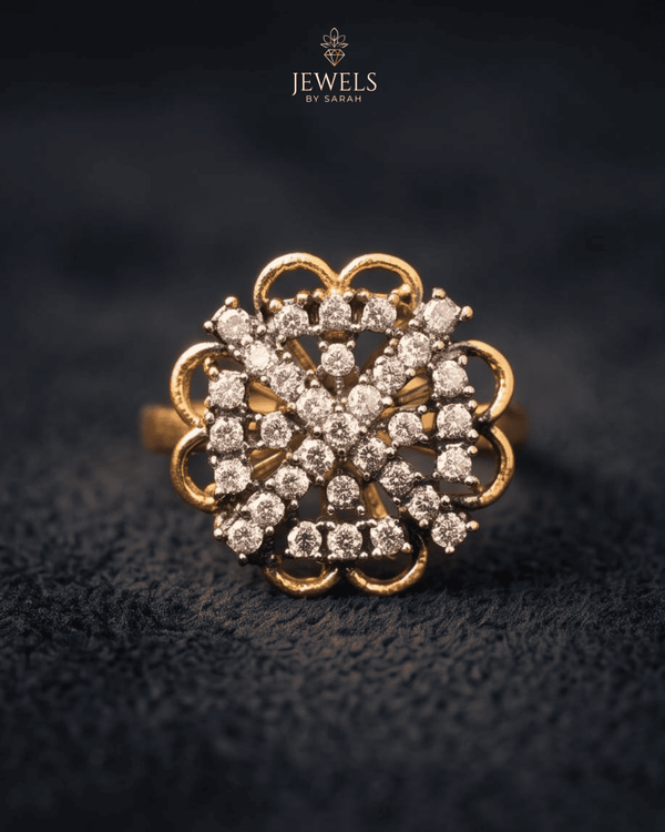 "Crystal floral gold plated ring with scalloped design on dark fabric by Jewels by Sarah"